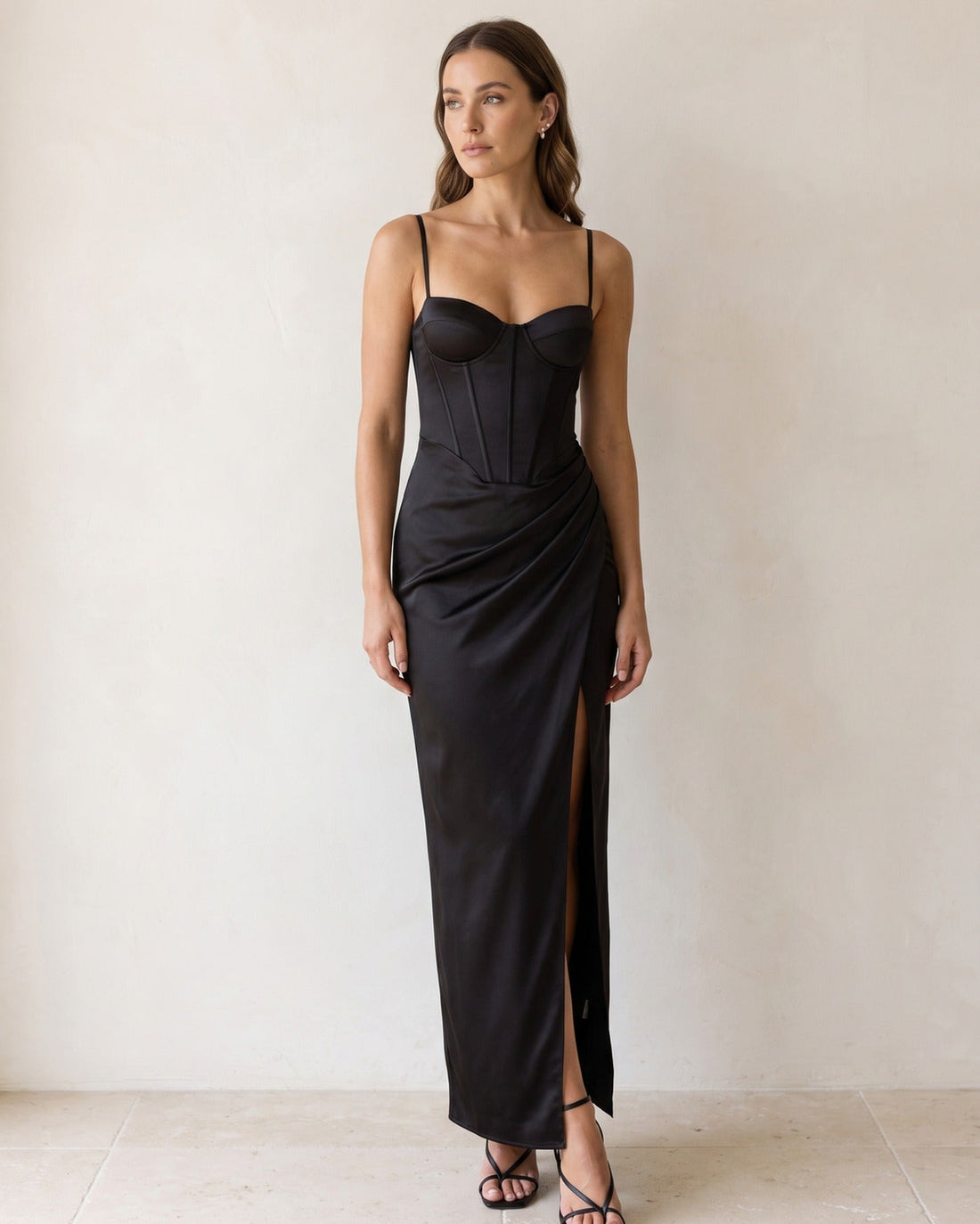 Red bustier-style maxi dress with a high slit from LUNETTE